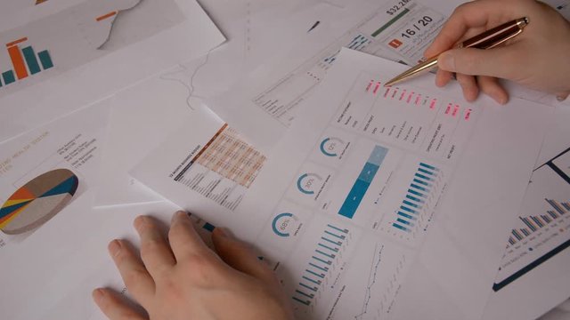 Trader Man hands Working With Documents And Financial Report, srock market concept