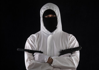 man in white overalls with pistols
