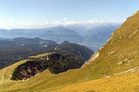 View from mountain Ifinger near Merano with view on the ropeway station in South Tyrol, Italy