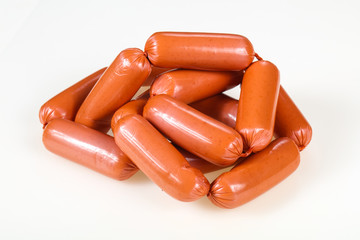 Tasty meat sausages over white background