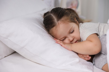 Fototapeta na wymiar Cute little girl sleeping at home. Bedtime schedule