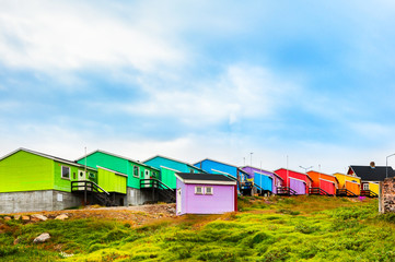 Fototapeta na wymiar Colorful houses in Qeqertarsuaq village, western Greenland.
