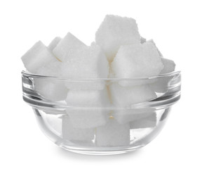 Refined sugar cubes in glass bowl isolated on white