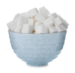 Refined sugar cubes in bowl isolated on white