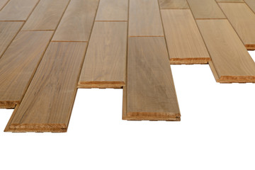 The surface of small dark dowel boards. Diagonal view from above.