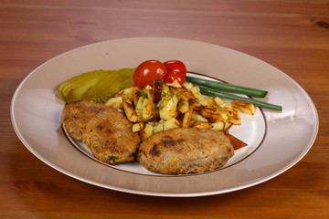 Homemade cutlet with roasted potato