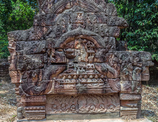 ancient temple complex in Cambodian jungle.