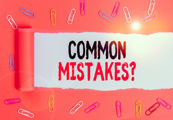 Writing note showing Common Mistakes Question. Business concept for repeat act or judgement...