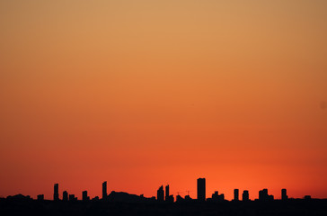 Fototapeta na wymiar Sunset over Benidorm city skyline in Alicante with text space