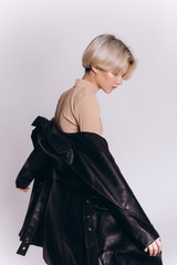 Close up portrait of young sensual girl posing in studio on isolated background. Fashion,mood, beauty, feelings, free lifestyle concept