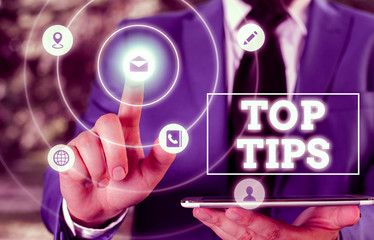 Conceptual hand writing showing Top Tips. Concept meaning a small but particularly useful piece of practical advice