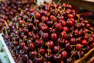 Stall of organic vegetables and fruits at a farmers market. Selling organic fresh agricultural product at farmer market.