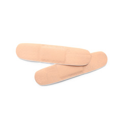 Medical sticking plasters isolated on white. First aid item
