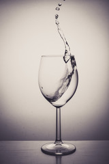 Glass with water up and splash
