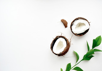 Cosmetic background. Organic cosmetics with coconut on a white background. Top  View. Copy space.