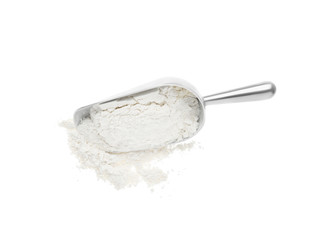 Scoop with flour isolated on white, top view