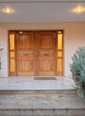 Fototapeta na wymiar luxury house entramce wooden door early in the evening, Athens Greece
