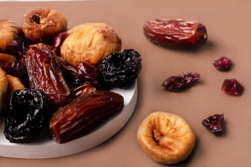 dried fruits and nuts on white background