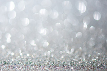 Silver rich expensive abstract background with bokeh effect, fabulous shining sparkles, magic...