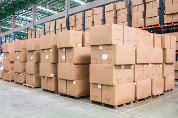 Rows of material boxes or product boxes in warehouse area.