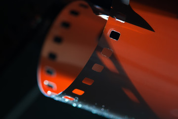 Photographic film close-up. Beautiful lighting. Shadows and relief of the film. Film Festival. The...