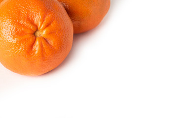 Fresh ripe orange mandarin on the white background.