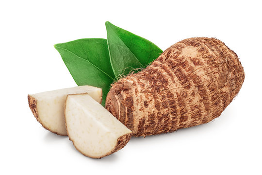 fresh taro root with slices and leaf isolated on white background
