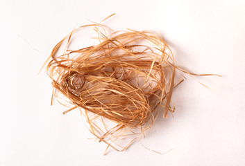 Wrapped dry grass for packaging on a white background