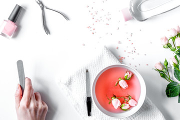 salt and cream for nail care in spa top view