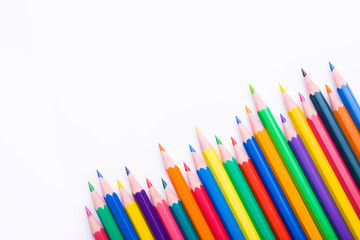 Different color pencils on white background. Composition with colored pencils, closeup view, space for text