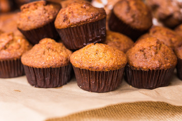 Pastry shop with chocolate cupcakes, close up