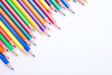 Different color pencils on white background. Composition with colored pencils, closeup view, space for text