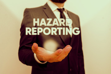 Conceptual hand writing showing Hazard Reporting. Concept meaning account or statement describing...