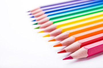 Different color pencils on white background. Composition with colored pencils, closeup view, space for text