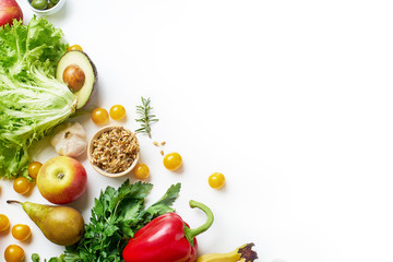 Various healthy raw organic vegetables, herbs, sprouts and fruits isolated on white background. Top view vegetarian food with copy space