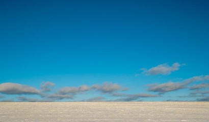 Fototapeta na wymiar winter landscape with Cumulus clouds in a blue sky