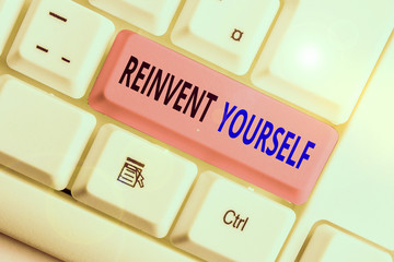 Writing note showing Reinvent Yourself. Business concept for to do something differently from...