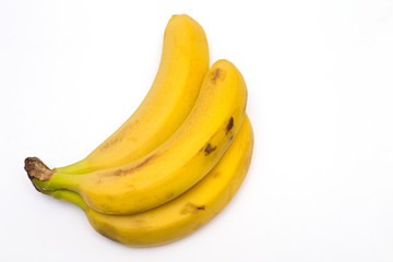 Bunch of ripe bananas isolated on a white background.
