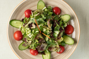 various fresh mix salad leaves with tomato 