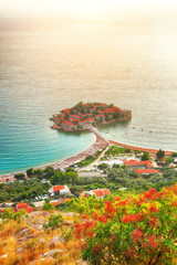 Aerial sunset view of the islet Sveti Stefan from church st. Sava viewpoint