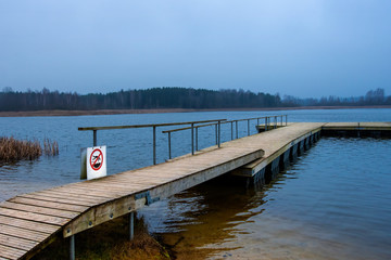 Floating wooden pier  on the lake