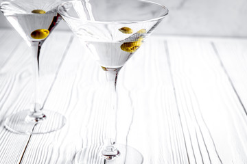 martini cocktail at wooden background close up