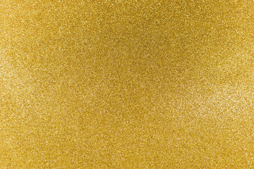 Fototapeta premium Golden shiny background. gold glitter texture christmas abstract background.