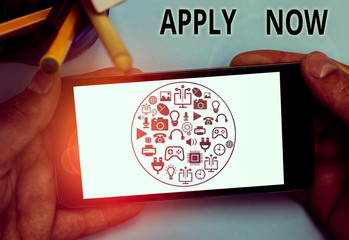 Text sign showing Apply Now. Business photo text An act of a demonstrating to acquire the job...