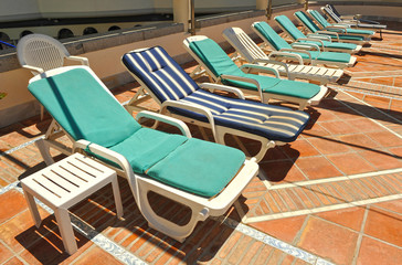 Sun beds and hammocks on the solarium terrace of a coast hotel, Spain