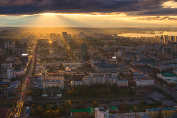 Fototapeta na wymiar view of the evening evening morning city center with a river pond after rain dawn sunset in the city of yekaterinburg iset sverdlovsk ural russia