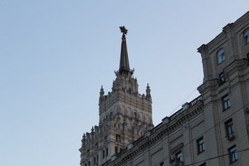 Fototapeta na wymiar beautiful building against the blue sky Stalin skyscraper with a star