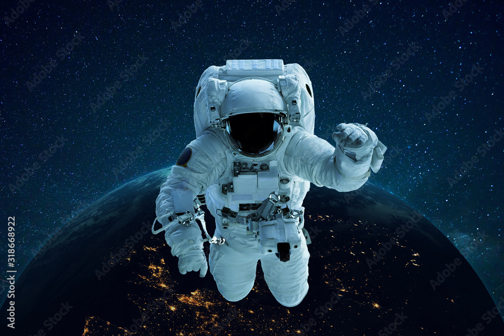 Poster astronaut in outer space on the background of the planet earth. spaceman levitates. travel concept
