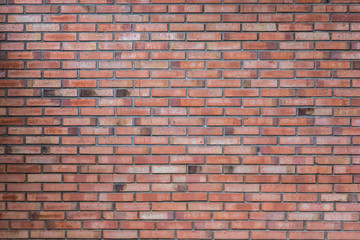 Obraz premium Details of old, weathered brickwork in a brick wall. Image would work as a background or wallpaper.