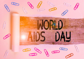 Conceptual hand writing showing World Aids Day. Concept meaning 1st December dedicated to raising...